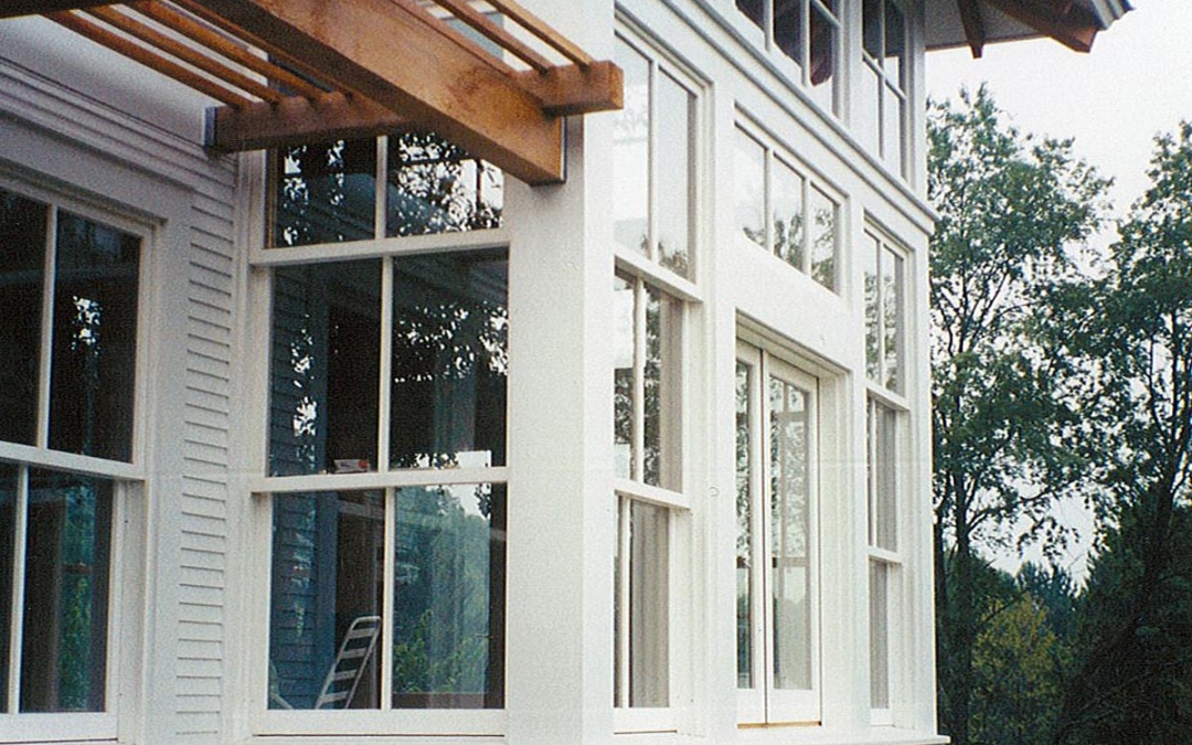 Triple Hung Windows with Motorized Awning Above